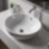 Close-up of a gleaming white ceramic sink