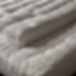 An elegant display of various mattress types showcasing their unique textures and structures