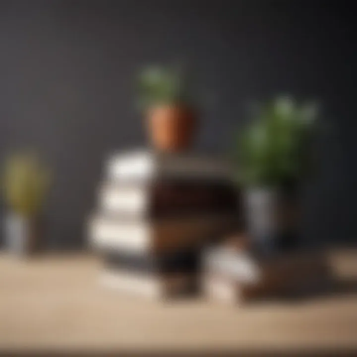 Minimalistic workspace featuring a stack of design books as decor